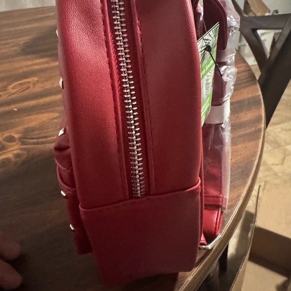 Elegant Red Quilted Backpack with Studs